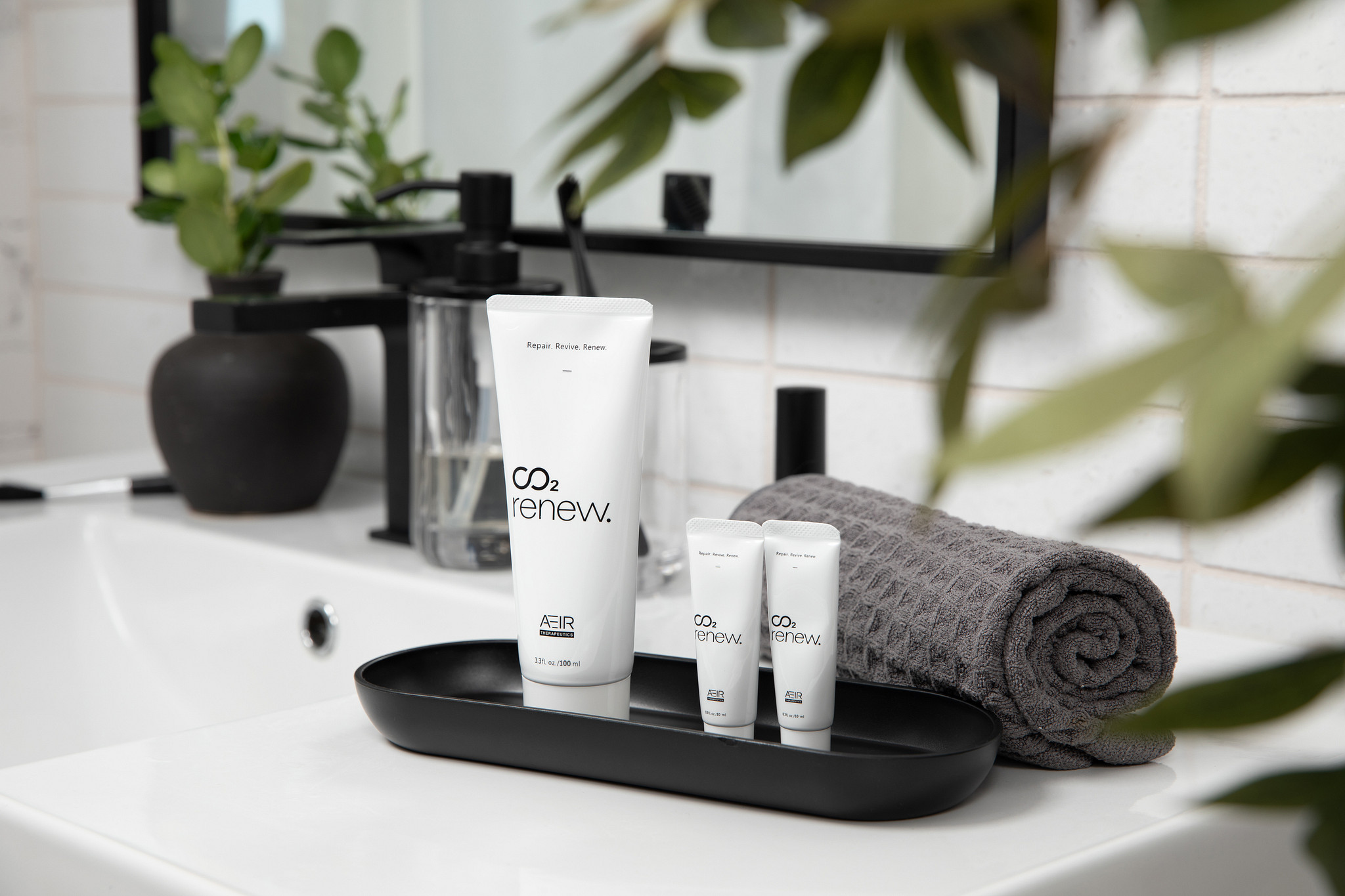 CO2 Renew paste flatlay — clinical-grade skincare in a minimalist tube.